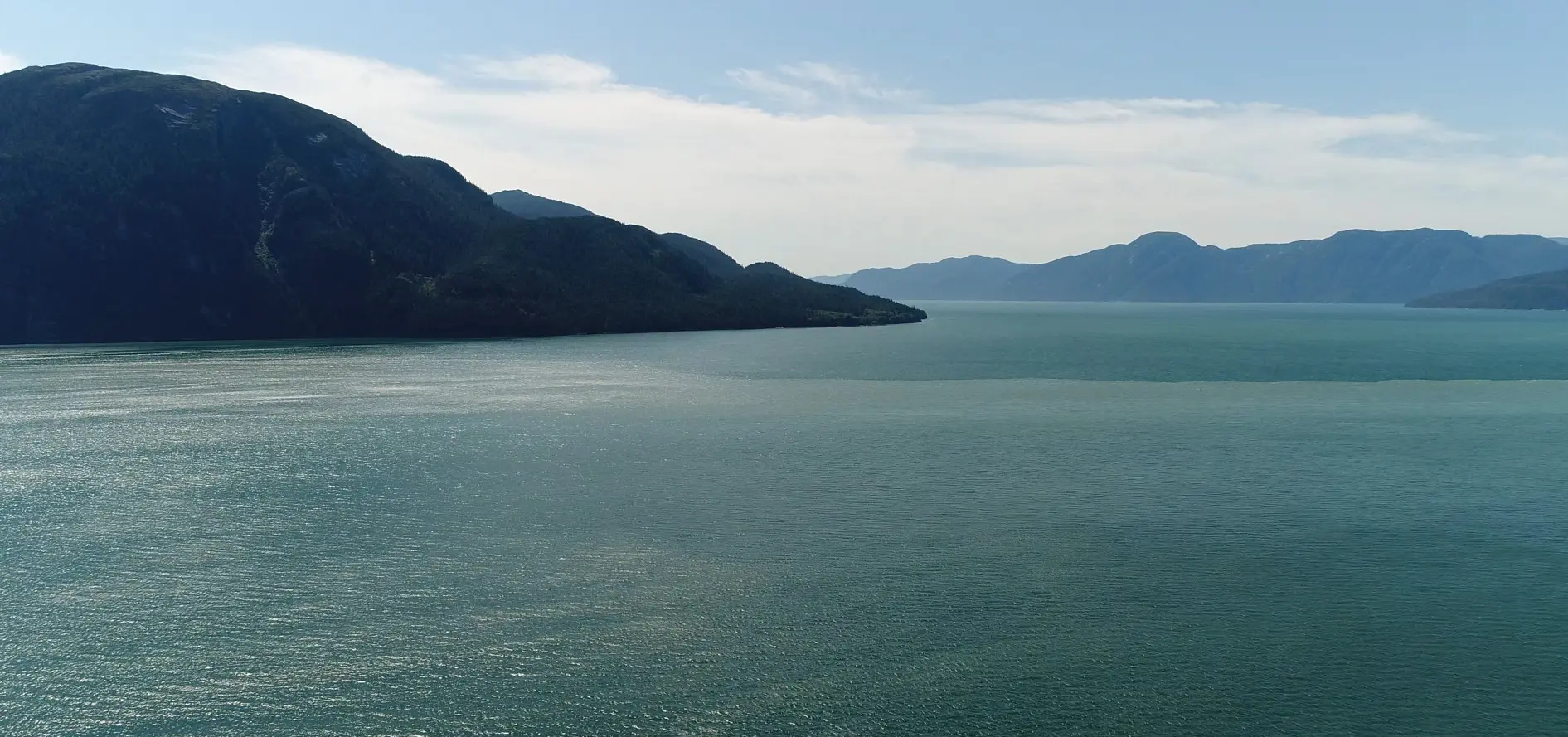 island and ocean in calming blues and greens