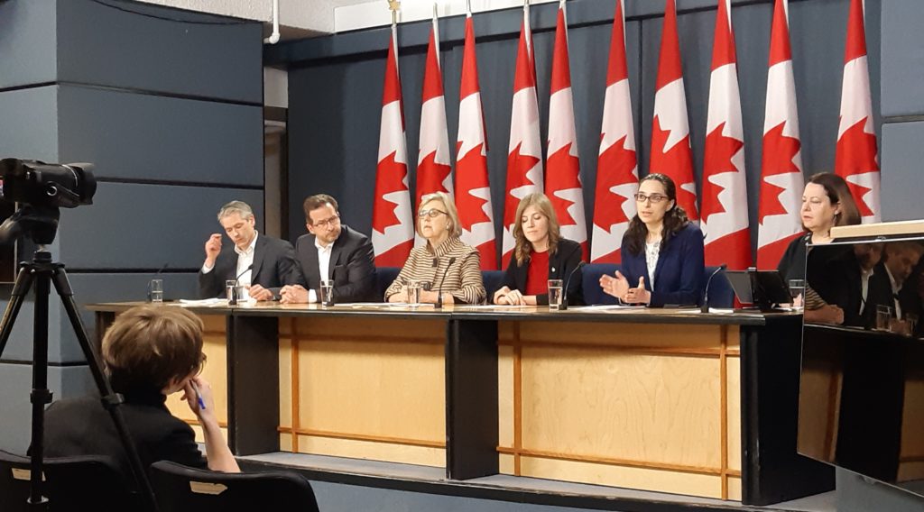 Panel of opposition group members at a joint press conference